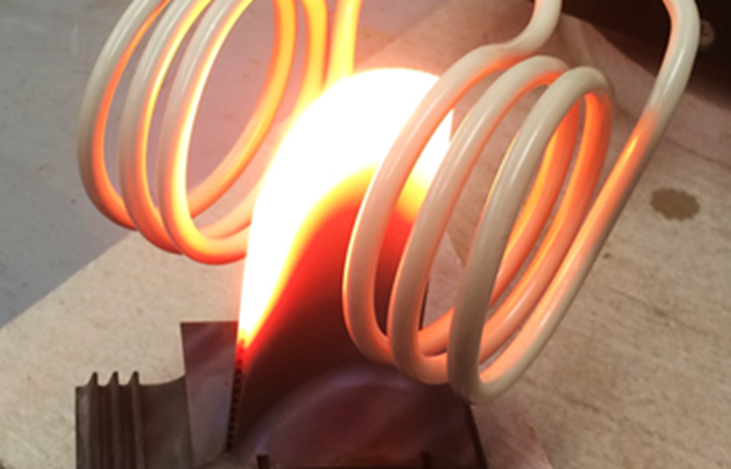 Bench mounted induction heating focuses on small components
